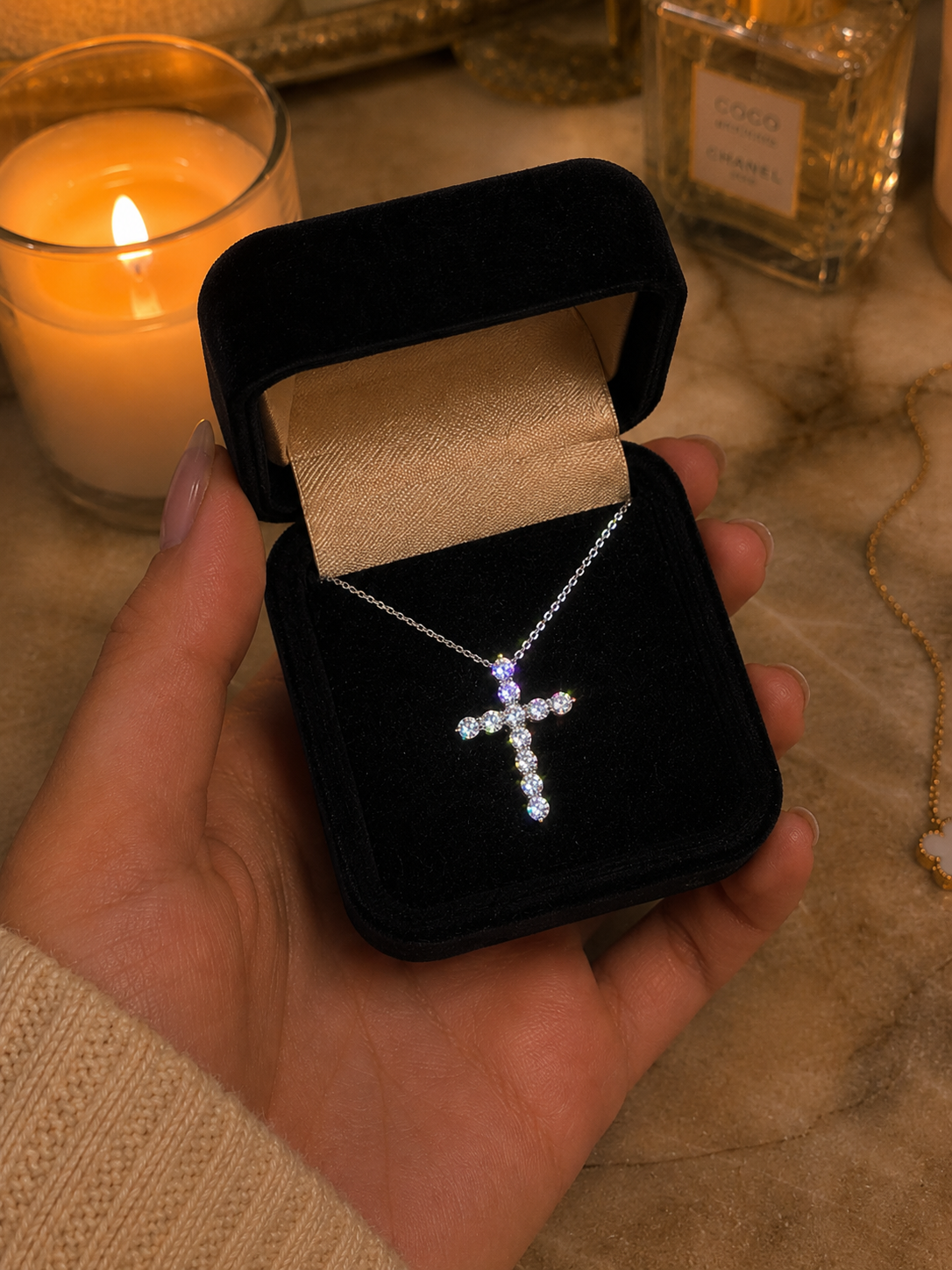 Small Cross Necklace box in hand
